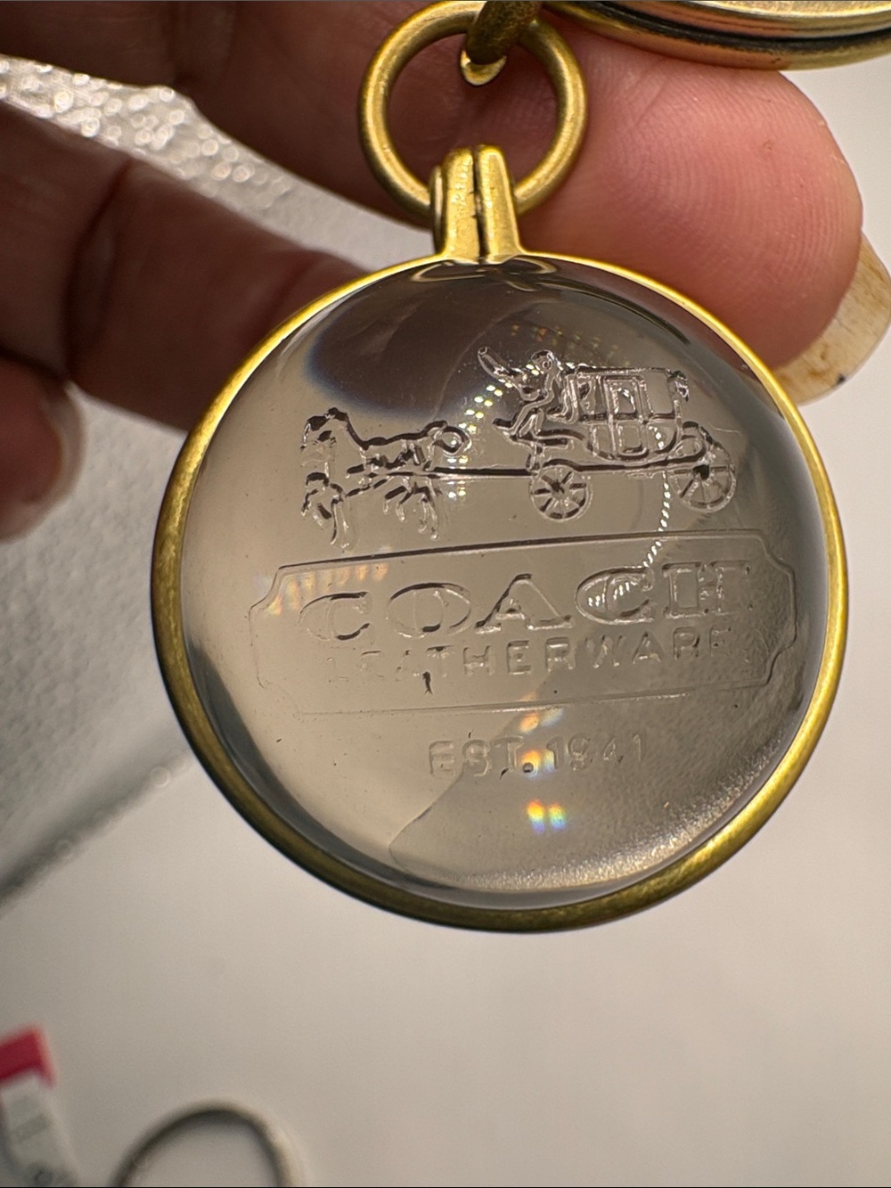 Coach brass and Clear Horse & Carriage Orb Keyring Charm